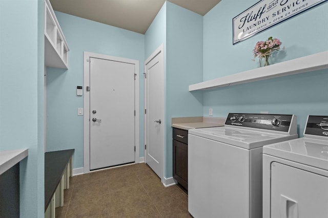 402 Burnt Sienna Dr, Middleton, WI 53562 - washroom with washing machine and clothes dryer, cabinet space, and baseboards