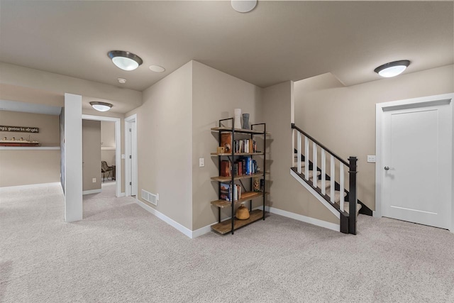 402 Burnt Sienna Dr, Middleton, WI 53562 - interior space with carpet, visible vents, baseboards, and stairs