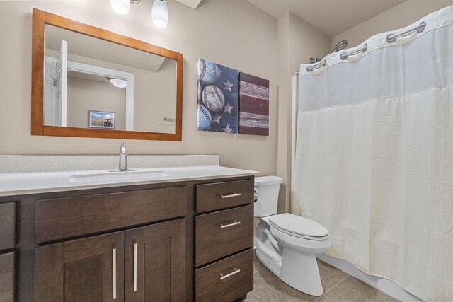 402 Burnt Sienna Dr, Middleton, WI 53562 - full bath with vanity, toilet, a shower with shower curtain, and tile patterned flooring