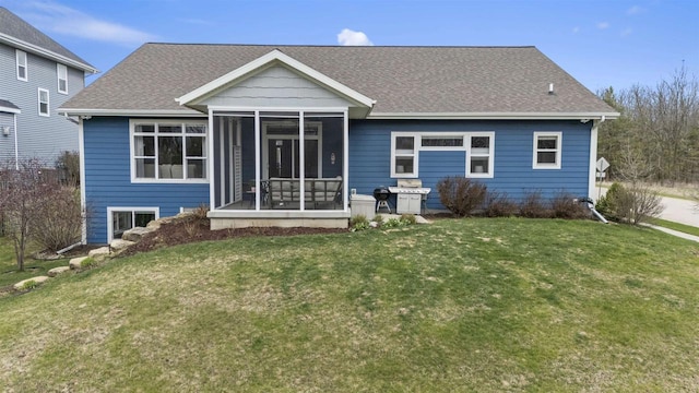 402 Burnt Sienna Dr, Middleton, WI 53562 - rear view of house featuring a yard, a shingled roof, and a sunroom