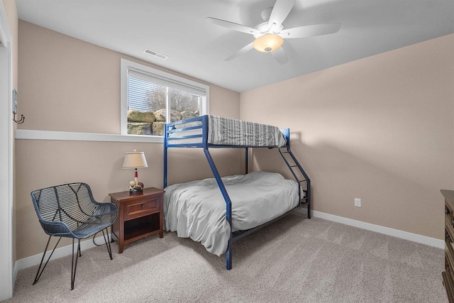 402 Burnt Sienna Dr, Middleton, WI 53562 - carpeted bedroom with a ceiling fan, visible vents, and baseboards