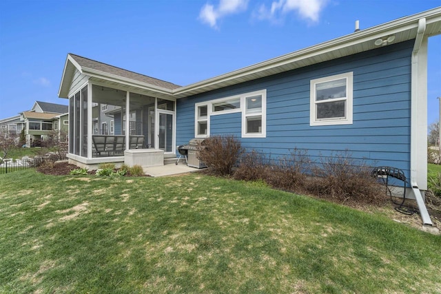 402 Burnt Sienna Dr, Middleton, WI 53562 - back of property with a sunroom and a lawn