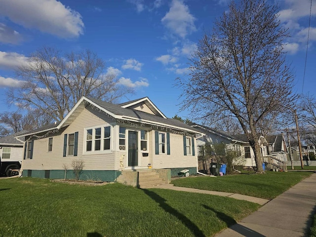 713 Dewitt St, Portage, WI 53901 - view of front of house featuring a front lawn