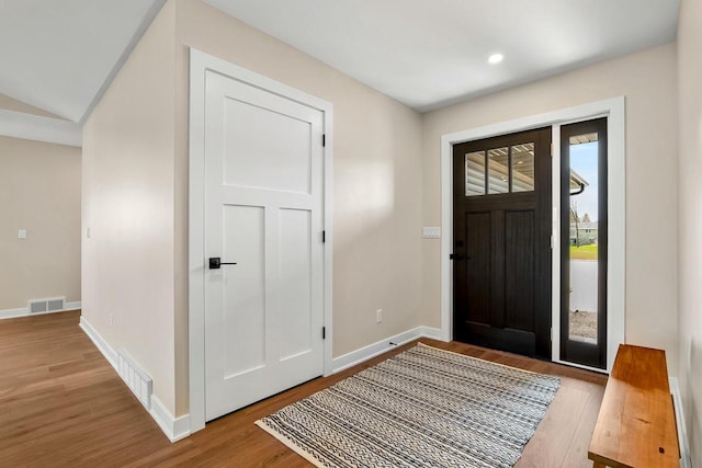 2352 Ryan Ave, Plymouth, WI 53073 - entrance foyer with baseboards, visible vents, wood finished floors, and recessed lighting