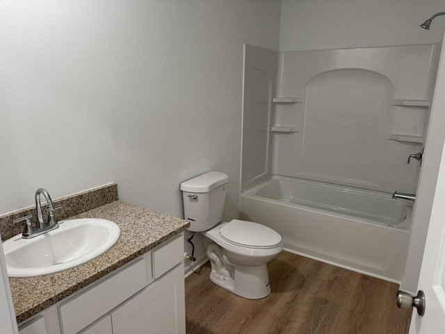 306 Filardo Ct, Mineral Point, WI 53565 - full bath with toilet, vanity, bathtub / shower combination, and wood finished floors