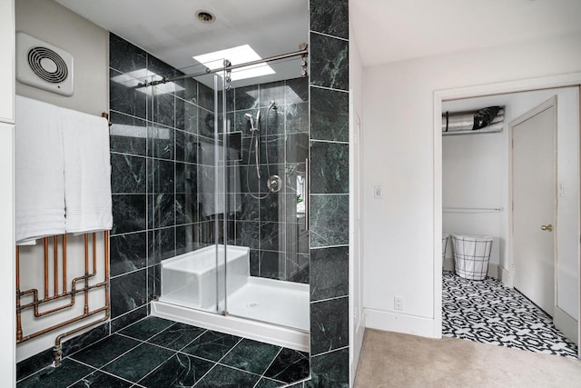 full bath with a stall shower and visible vents