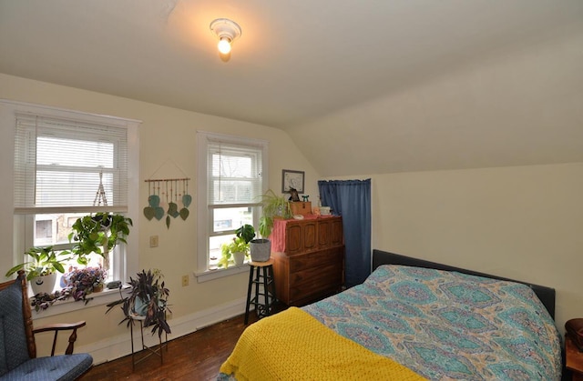 1922 45th St, Kenosha, WI 53140 - bedroom featuring wood finished floors, vaulted ceiling, and baseboards