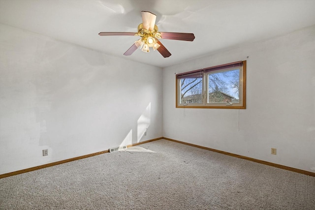 2500 S Brookside Pkwy, New Berlin, WI 53151 - carpeted spare room with baseboards, visible vents, and ceiling fan