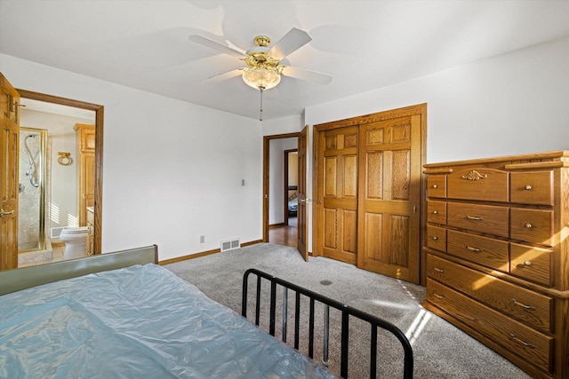 2500 S Brookside Pkwy, New Berlin, WI 53151 - carpeted bedroom with visible vents, a closet, a ceiling fan, and baseboards