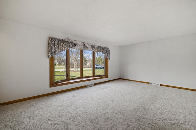 2500 S Brookside Pkwy, New Berlin, WI 53151 - spare room with carpet floors, visible vents, and baseboards