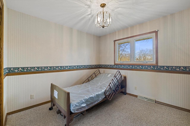 2500 S Brookside Pkwy, New Berlin, WI 53151 - bedroom with a chandelier, visible vents, carpet, baseboards, and wallpapered walls
