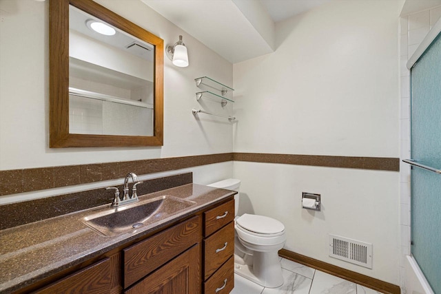 2500 S Brookside Pkwy, New Berlin, WI 53151 - bathroom featuring visible vents, an enclosed shower, toilet, vanity, and marble finish floor