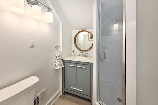 full bathroom with visible vents, vanity, toilet, and a shower stall