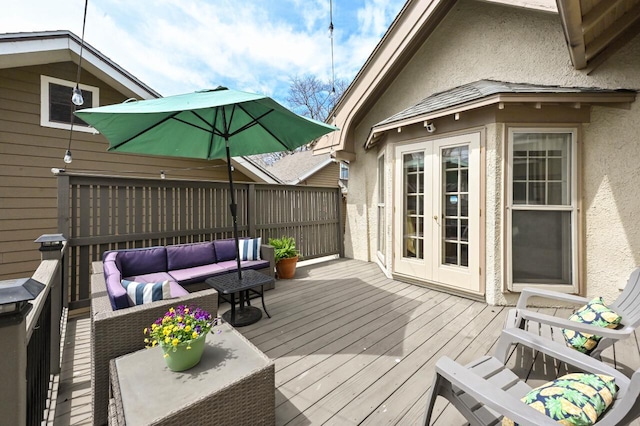 deck with french doors and outdoor lounge area