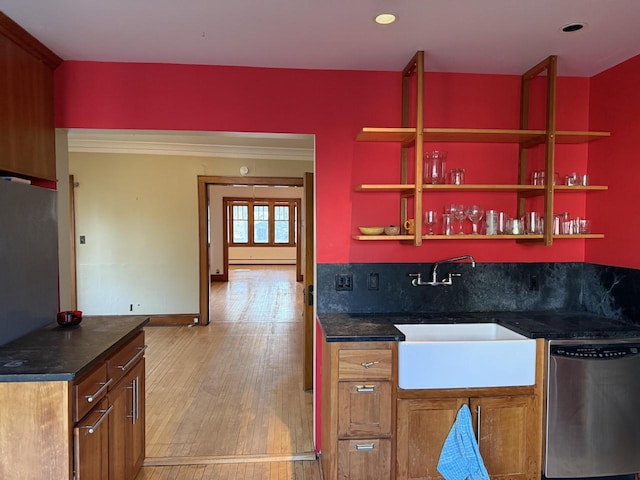2776 S Superior St, Bay View, WI 53207 - indoor wet bar with stainless steel dishwasher, light wood-type flooring, recessed lighting, and a baseboard radiator