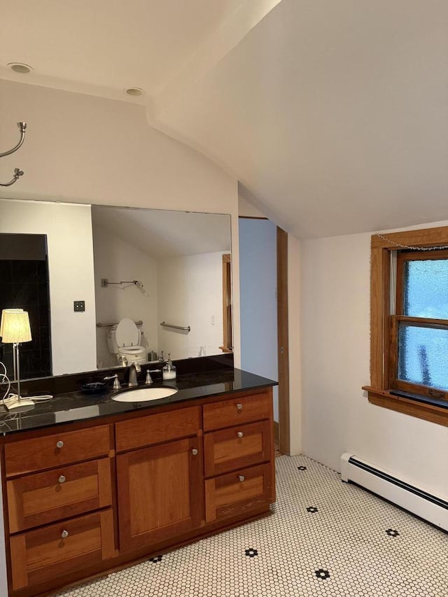 2776 S Superior St, Bay View, WI 53207 - bathroom featuring a baseboard radiator, lofted ceiling, and vanity
