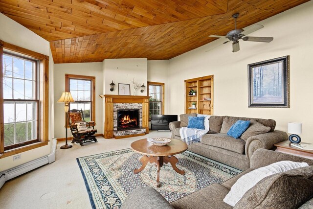 2108 Woodlawn Ln, Appleton, WI 54914 - carpeted living area with wooden ceiling, a ceiling fan, vaulted ceiling, a lit fireplace, and baseboard heating