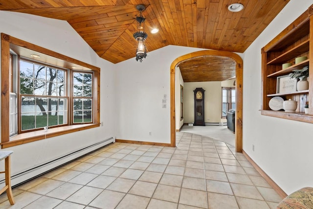2108 Woodlawn Ln, Appleton, WI 54914 - unfurnished room featuring plenty of natural light, arched walkways, vaulted ceiling, and a baseboard radiator