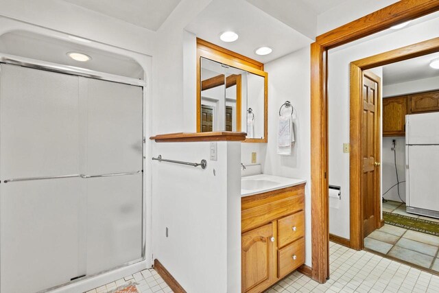2108 Woodlawn Ln, Appleton, WI 54914 - full bathroom with a shower stall, baseboards, recessed lighting, tile patterned floors, and vanity