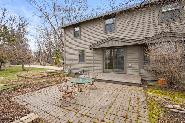 2108 Woodlawn Ln, Appleton, WI 54914 - rear view of house featuring a patio