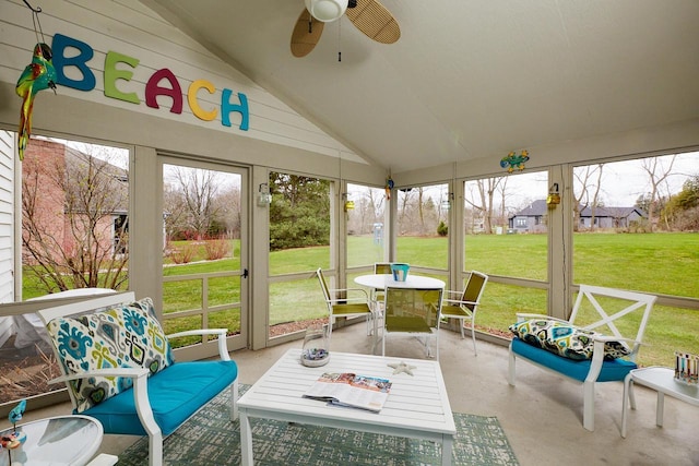 sunroom with outdoor dining space, ceiling fan, and plenty of natural light