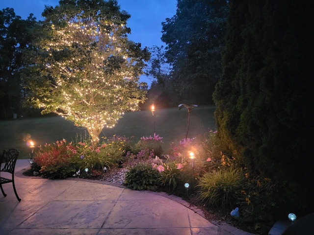 view of patio at twilight