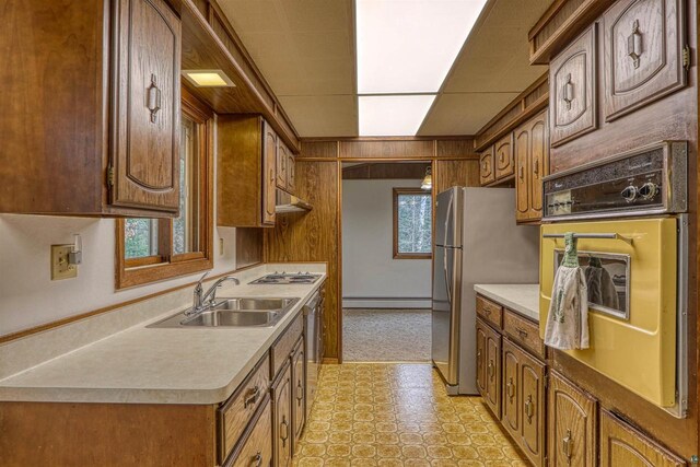 10749 N Namekagon Ln, Hayward, WI 54843 - kitchen with a sink, light countertops, freestanding refrigerator, gas cooktop, and oven