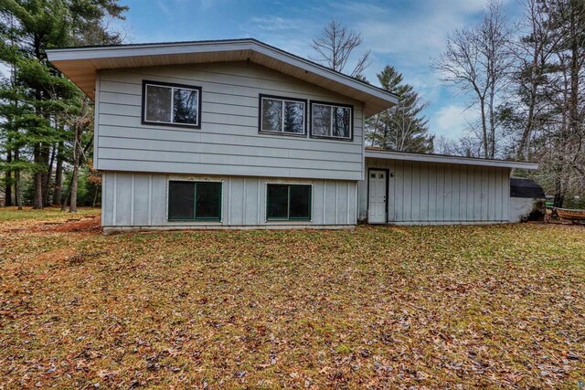 10749 N Namekagon Ln, Hayward, WI 54843 - rear view of house with board and batten siding