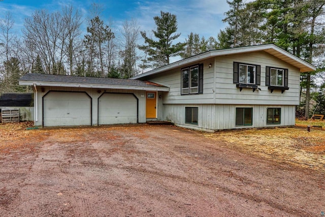 10749 N Namekagon Ln, Hayward, WI 54843 - split level home with driveway and an attached garage