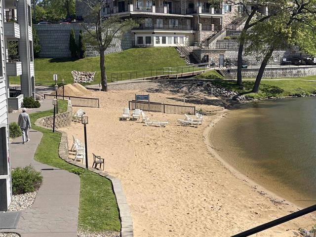 view of home's community with a water view