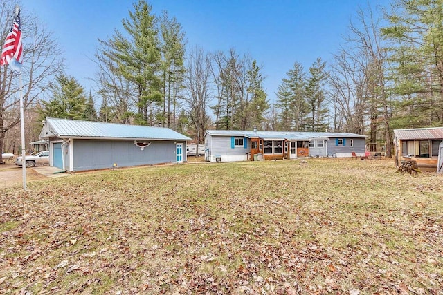11689 Eagle Bluff Ln, Crivitz, WI 54114 - rear view of property with an outbuilding and a yard