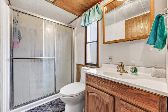 11689 Eagle Bluff Ln, Crivitz, WI 54114 - bathroom with toilet, a shower stall, and vanity