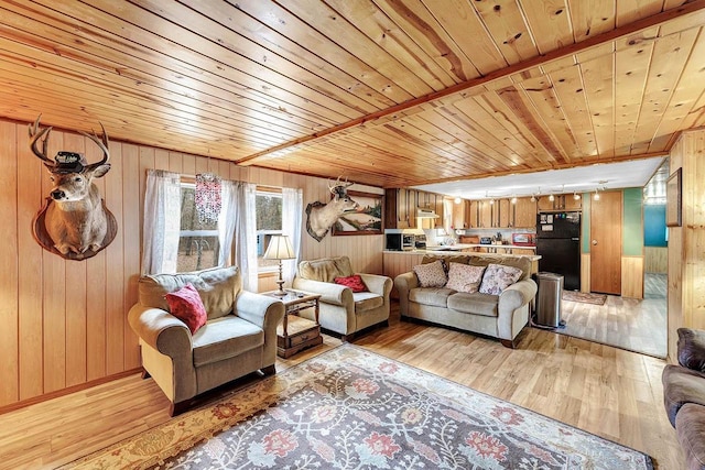 11689 Eagle Bluff Ln, Crivitz, WI 54114 - living area with wood walls, light wood-style floors, and wood ceiling