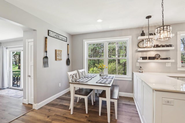 911 Fawn Ct, Wisconsin Dells, WI 53965 - dining room with a chandelier, baseboards, dark wood finished floors, and recessed lighting