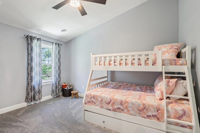 911 Fawn Ct, Wisconsin Dells, WI 53965 - bedroom with carpet flooring, baseboards, a ceiling fan, and vaulted ceiling