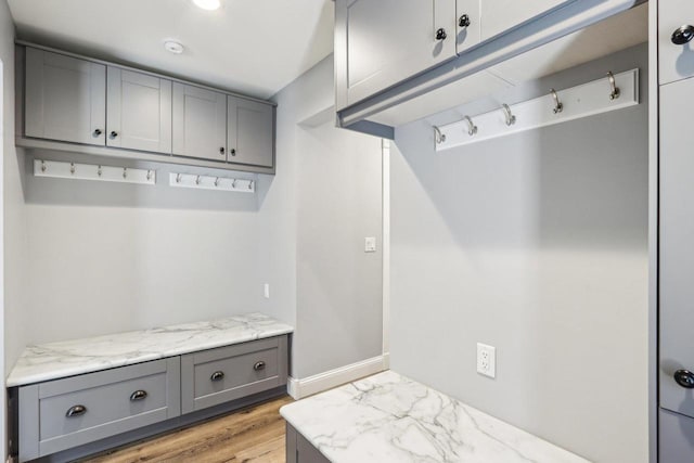 911 Fawn Ct, Wisconsin Dells, WI 53965 - mudroom featuring light wood-style floors and baseboards