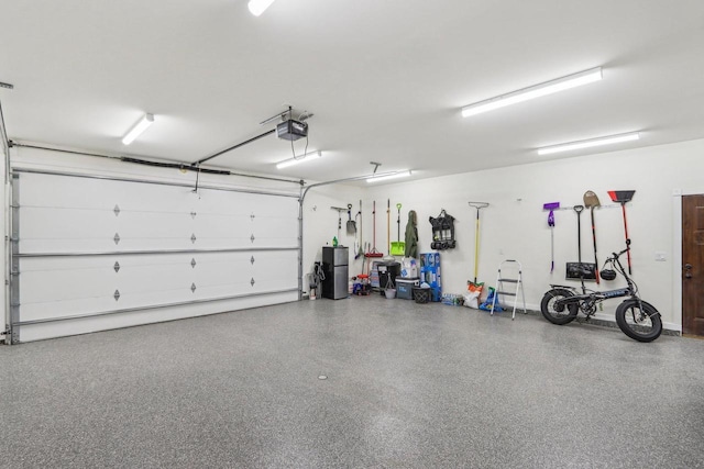 911 Fawn Ct, Wisconsin Dells, WI 53965 - garage with a garage door opener