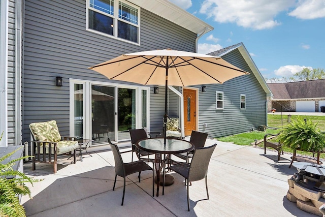 911 Fawn Ct, Wisconsin Dells, WI 53965 - view of patio with outdoor dining area