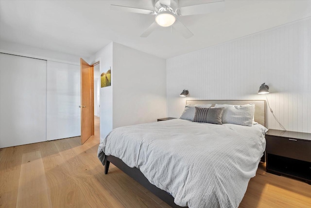 bedroom with ceiling fan and wood finished floors