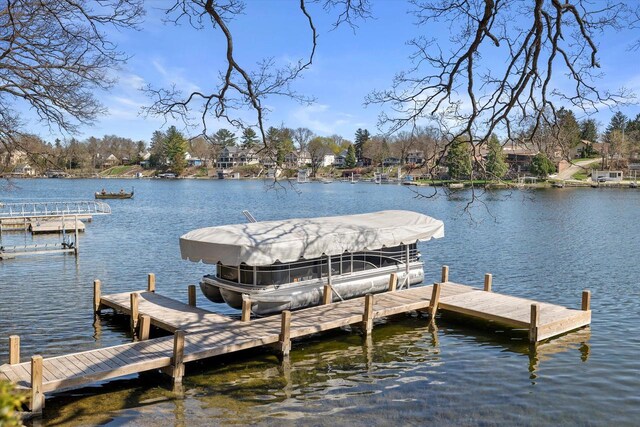view of dock with a water view