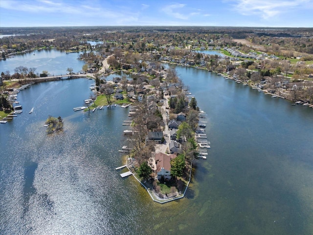 birds eye view of property featuring a residential view and a water view