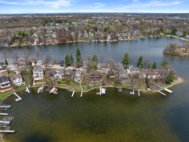 aerial view with a residential view and a water view