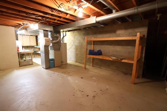unfinished basement with heating unit