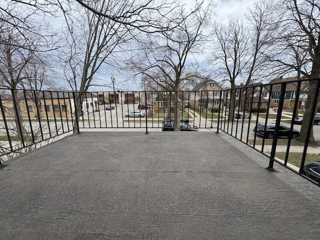view of gate with a residential view