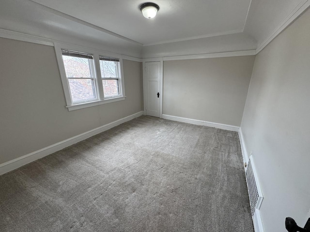 unfurnished room with carpet flooring, baseboards, and visible vents