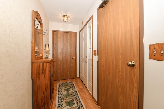 doorway featuring light wood-type flooring