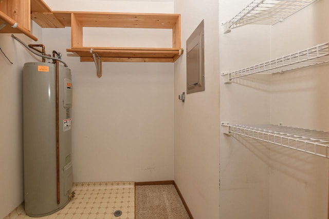 spacious closet with electric panel and water heater