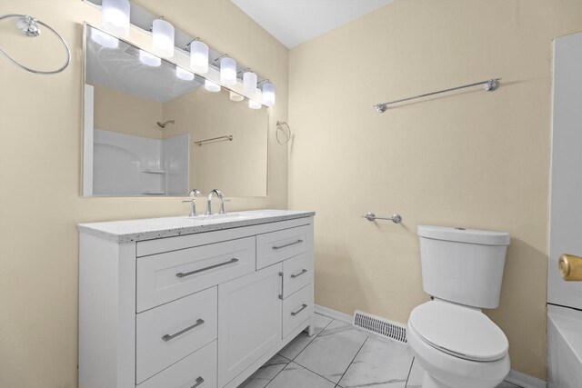 9073 N Joyce Ave, Milwaukee, WI 53224 - bathroom with a shower, visible vents, baseboards, toilet, and vanity