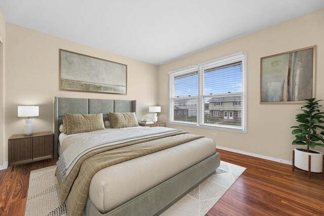 9073 N Joyce Ave, Milwaukee, WI 53224 - bedroom featuring baseboards and wood finished floors
