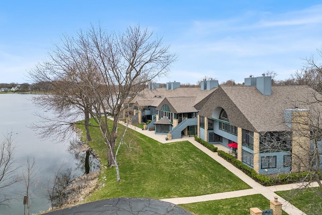 drone / aerial view with a water view